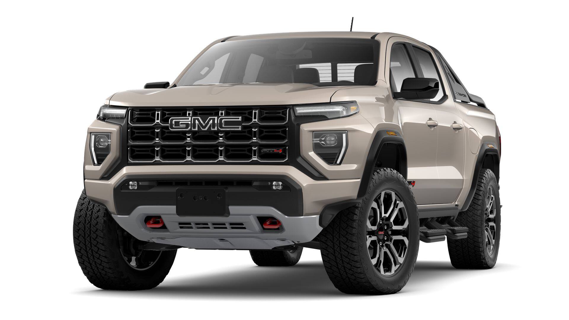 2026 GMC Canyon AT4 in Coastal Dune — front three-quarter view