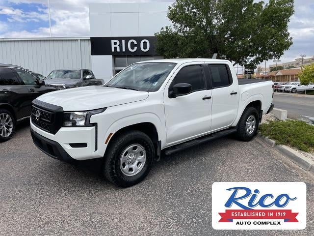 2022 Nissan Frontier S in Glacier White — front three-quarter view